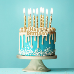 zestaw złotych świeczek na tort urodzinowy z napisem happy birthday