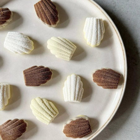 SF032 Madeleine Silikomart - forma silikonowa do magdalenek - dł. 68 x szer. 45 x wys. 17 mm / poj. 30 ml x 9 porcji