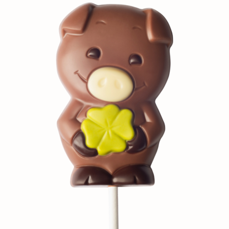 op. 35 g - Świnka z koniczyną - dekoracyjny lizak z mlecznej czekolady - dł. 165 mm