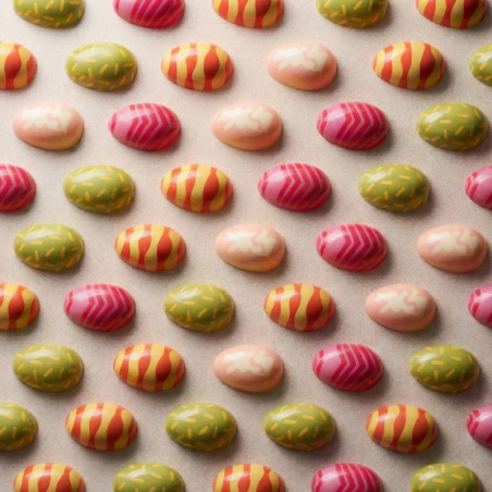 Uovo 01 P Silikomart - forma do pralin z Tritanu - jajka - dł. 40 x szer. 28 x wys. 14 mm / poj. 8. ml x 24 praliny