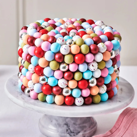 op. 130 g Czerwone chrupiące kulki czekoladowe do dekoracji - śr. 20 mm - choco crispy balls lipstick red - Fun Cakes